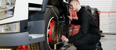 Apprentice inspecting LGV tyre 