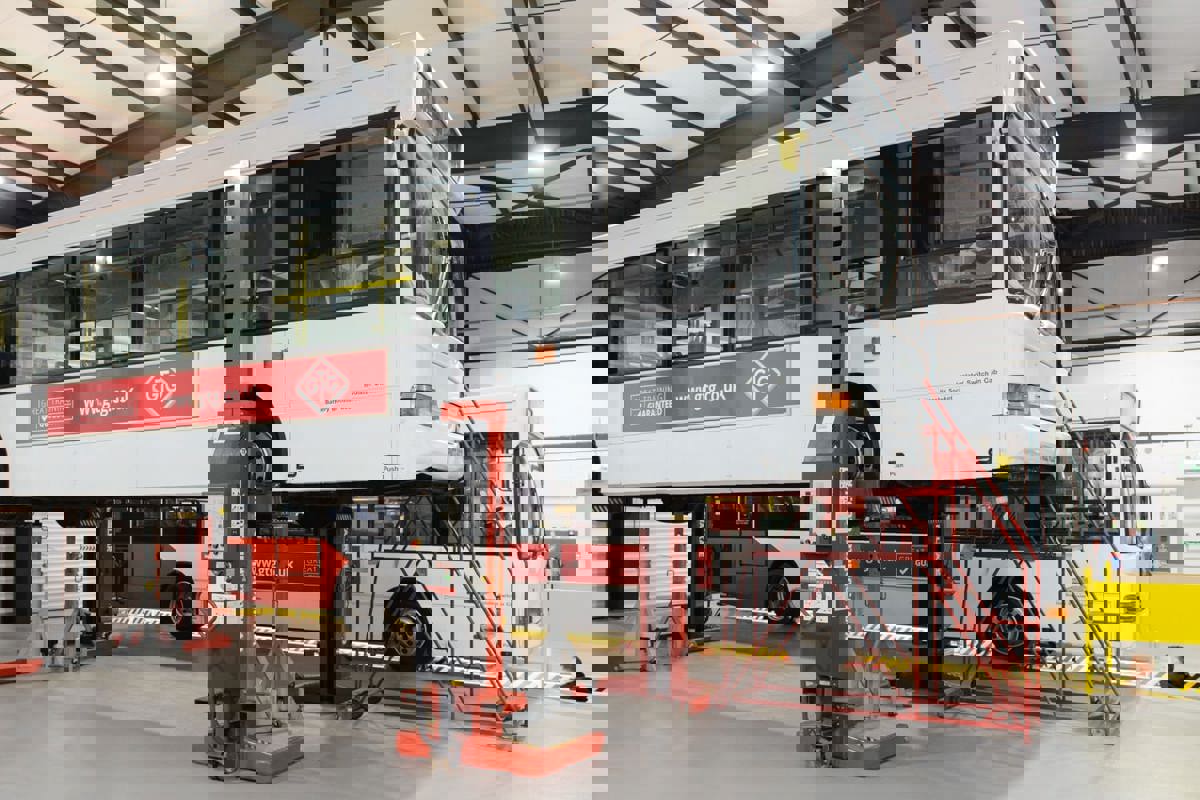 GTG bus raised on ramps