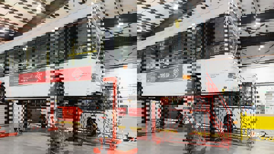 GTG bus raised on ramps