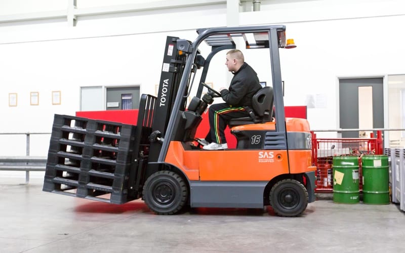 man driving a forklift