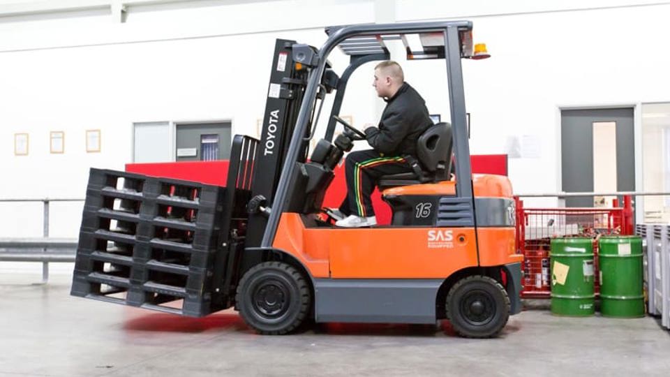 man driving a forklift