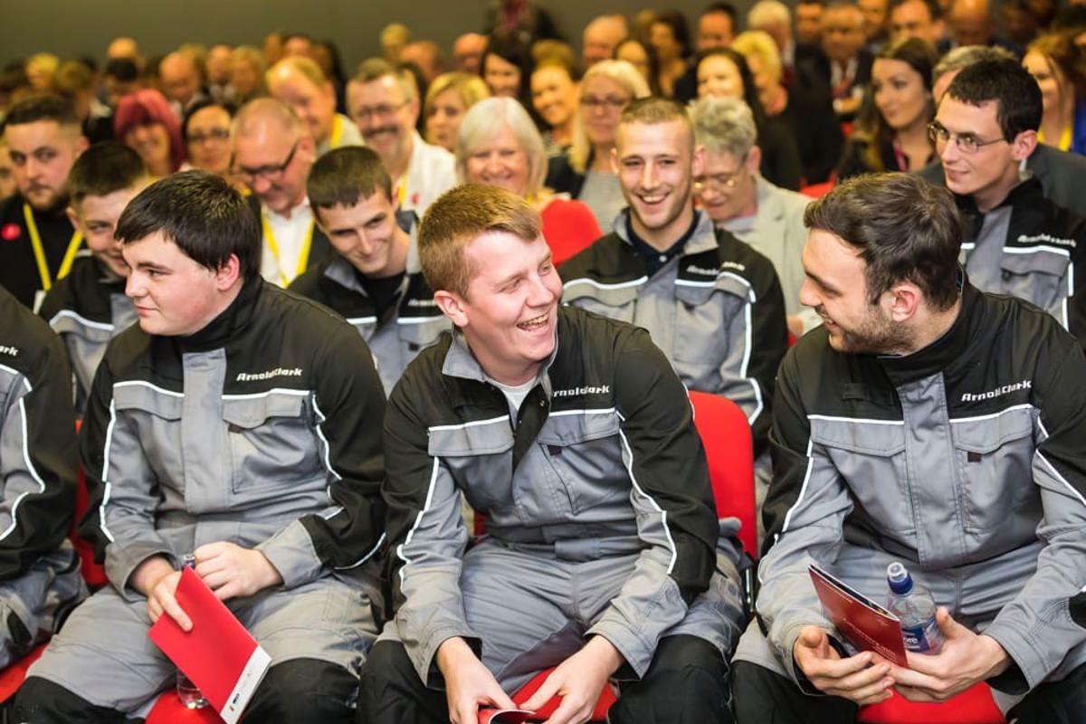 Group of apprentices and their parents in a GTG conference room