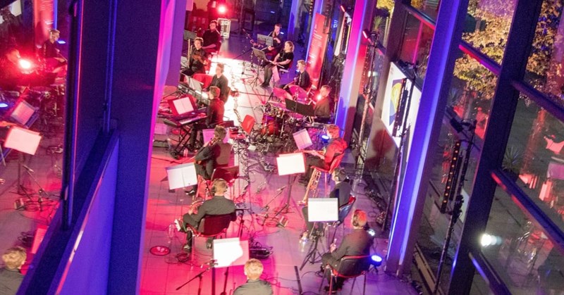 Orchestra playing inside GTGs Glasgow facility